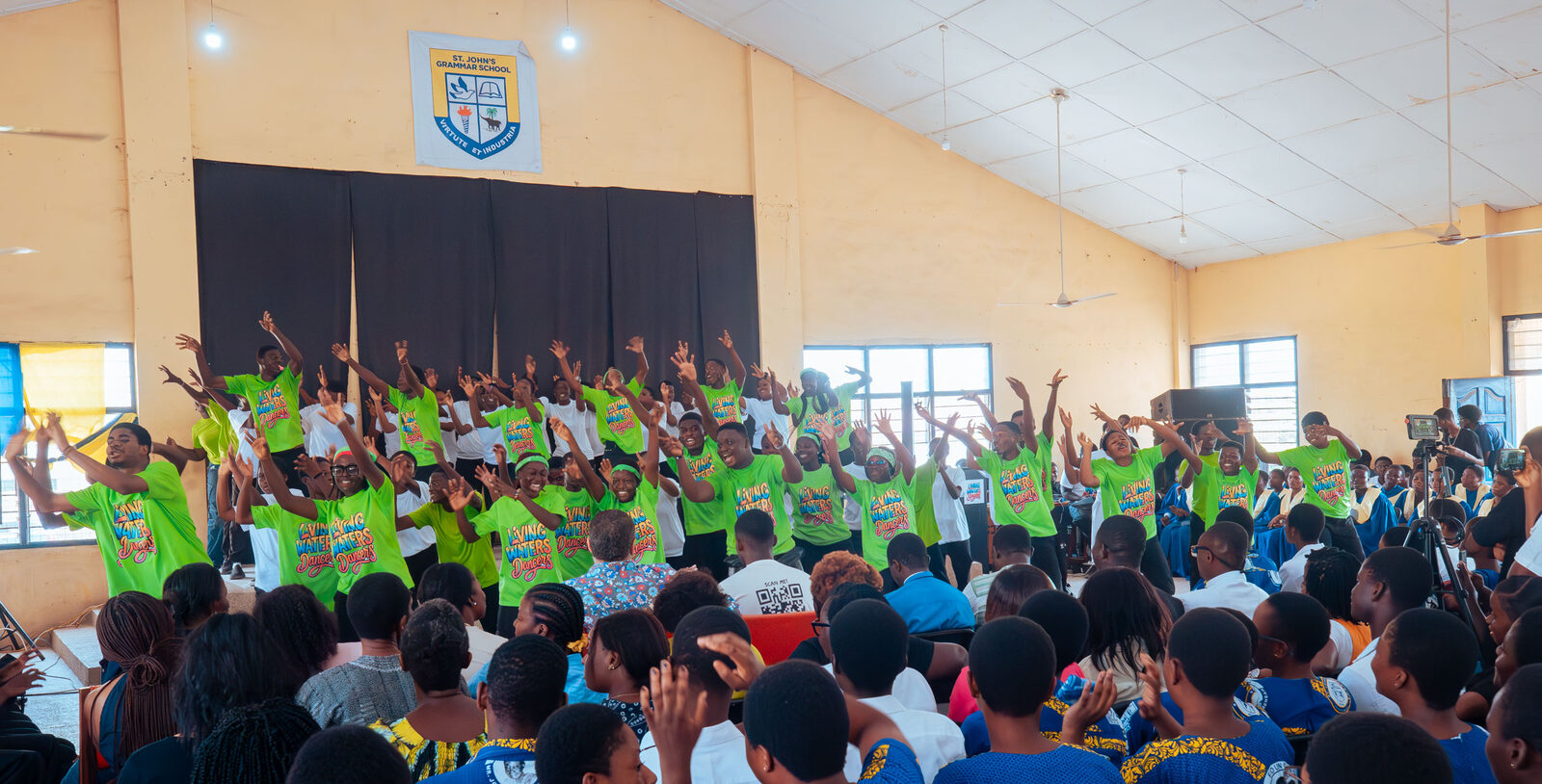 Living Waters Dancers performing indoors for a school assembly