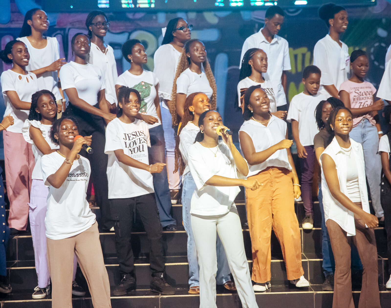 Living Waters Singers leading worship in white